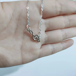 Adjustable Treble Clef Bracelet - Unique Music-Inspired Symbol, Adjustable Length for Comfortable Fit - Shiny Silver Tone Finish