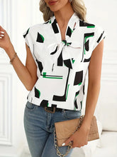 Load image into Gallery viewer, Chic Tie-Neck Blouse with Graphic Print - Cap Sleeve, Lightweight, Perfect for Spring/Summer - Size: L &amp; S