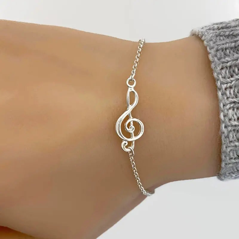 Adjustable Treble Clef Bracelet - Unique Music-Inspired Symbol, Adjustable Length for Comfortable Fit - Shiny Silver Tone Finish